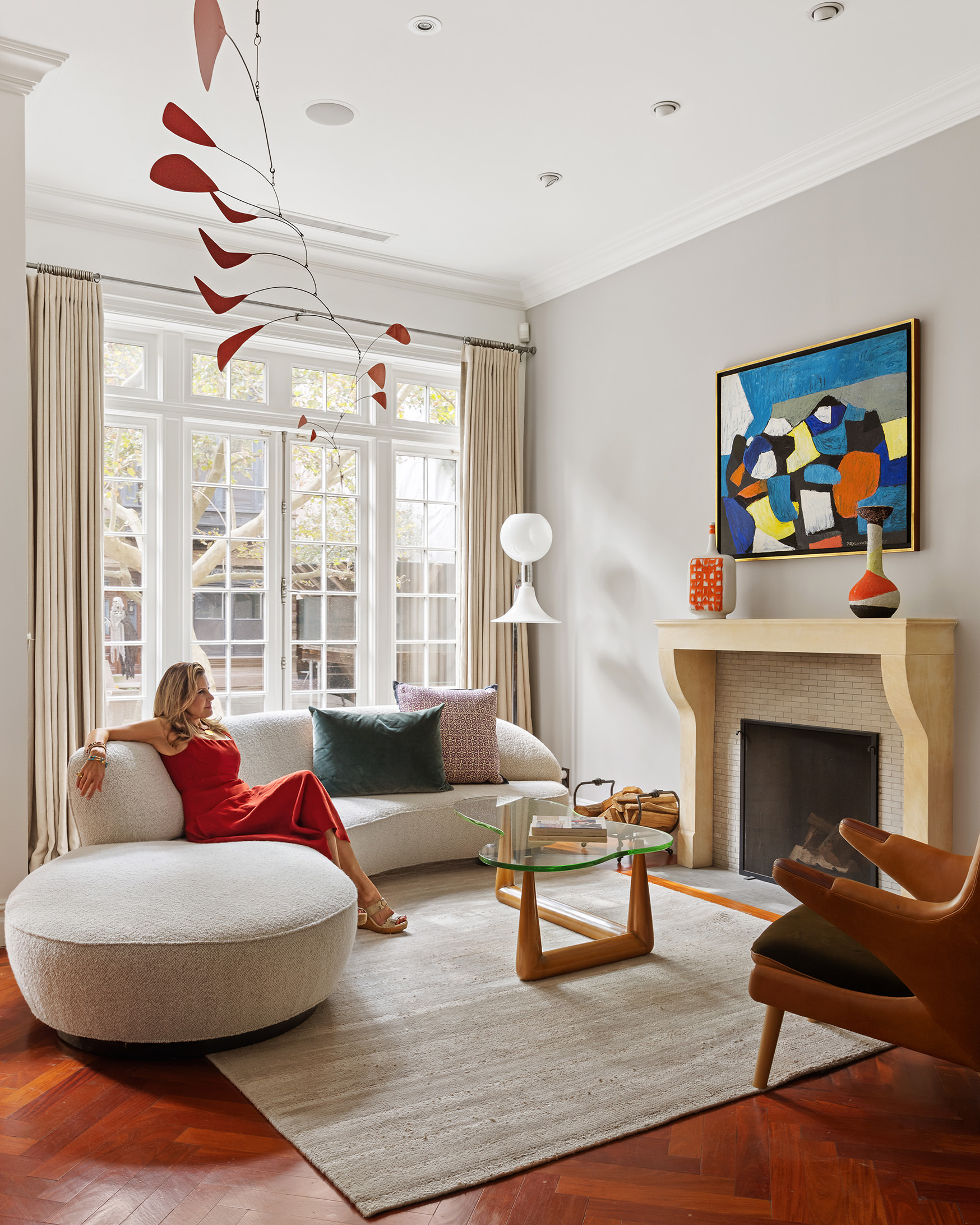 Luxury Manhattan living room with Calder mobile and fireplace